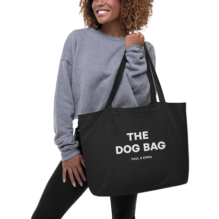 "Schwarze Hundetasche aus Bio-Baumwolle mit weißem Paul Emma Logo - The Dog Bag für Hundebesitzer"